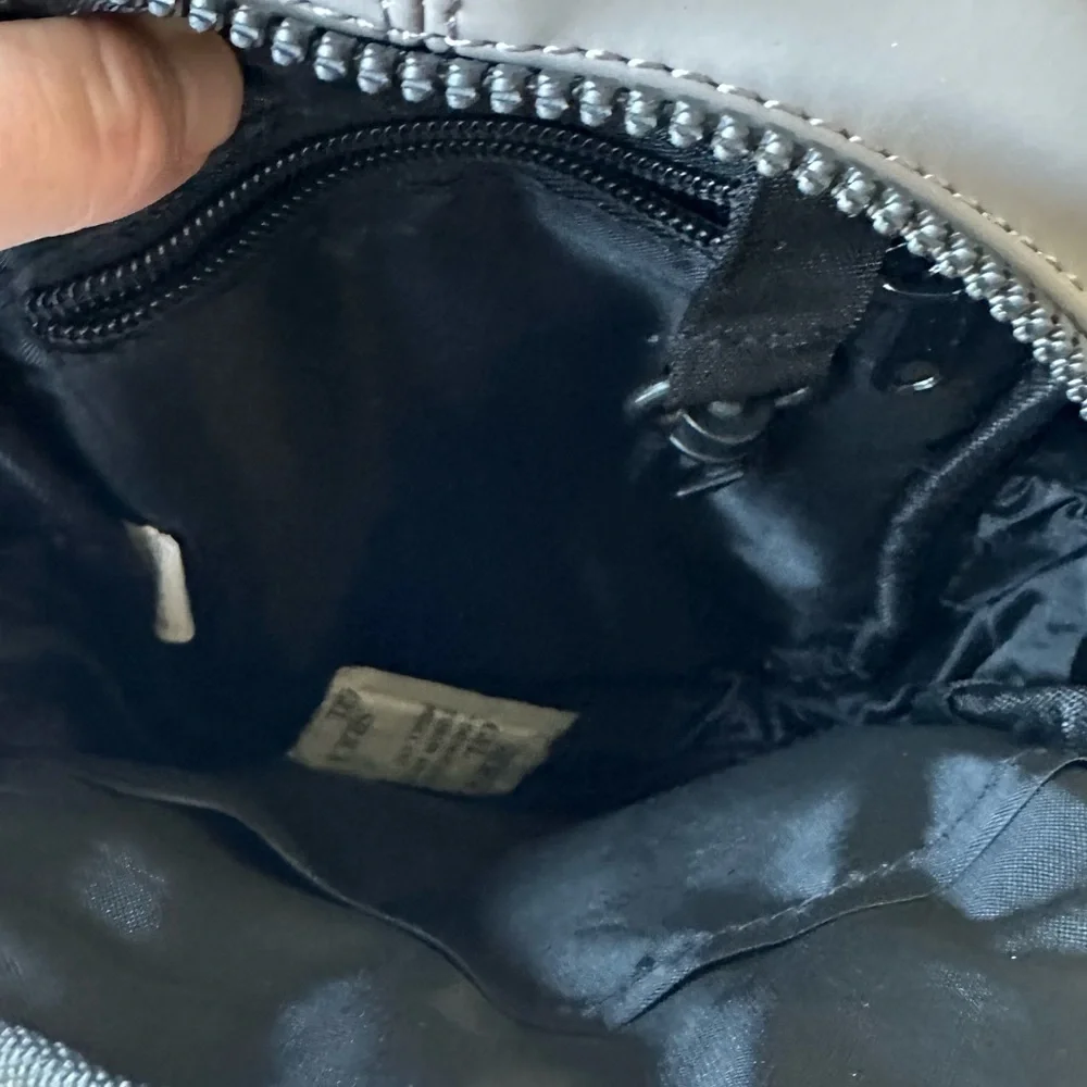 Duchamp Rubberized Sling Bag New